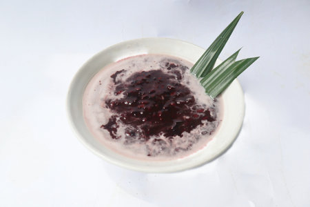 black sticky rice porridge in a bowl. bubur ketan hitam