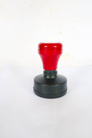 Stamp, modern Stamp, Red Handle Rubber Stamp Top View Isolated on White Background.