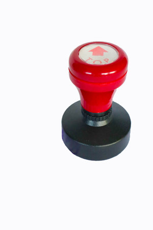 Stamp, modern Stamp, Red Handle Rubber Stamp Top View Isolated on White Background.