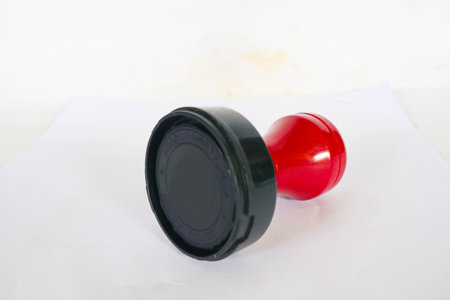 Stamp, modern Stamp, Red Handle Rubber Stamp Top View Isolated on White Background.