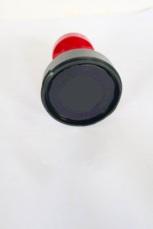 Stamp, modern Stamp, Red Handle Rubber Stamp Top View Isolated on White Background.の写真素材