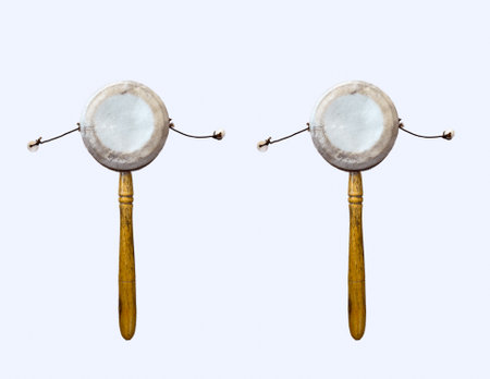 rattle drum, Damaru drum, pellet drum isolated on white backgroundの写真素材