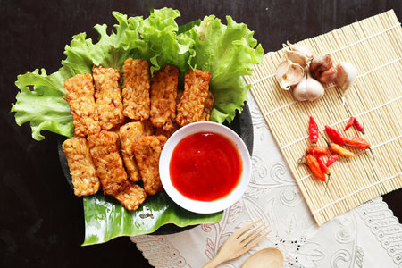 Tempeh, Tempe Goreng or Fried tempeh is Indonesia traditional food, made from fermented soybean...