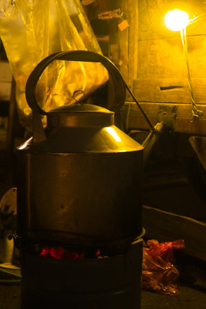 Yogyakarta august 17, 2024 : Angkringan is traditional street food menu is located in Malioboro Yogyakarta with beautiful lights at nightの写真素材