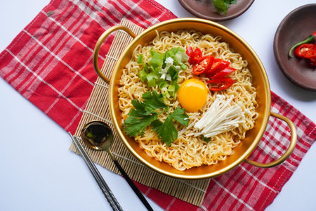 Ramyeon or Ramyun is Korean instant noodle, with spicy flavour topped with egg yolk, chilli,...