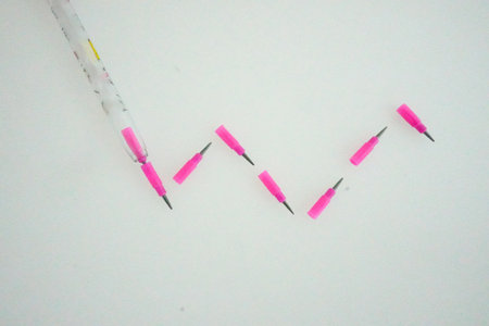 close up mechanical brick pencil with changeable tips on isolated white background