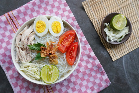 soto ayam bening or chicken soup is Indonesian food, made from rice, chicken broth, shredded...