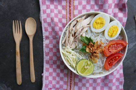 soto ayam bening or chicken soup is Indonesian food, made from rice, chicken broth, shredded...