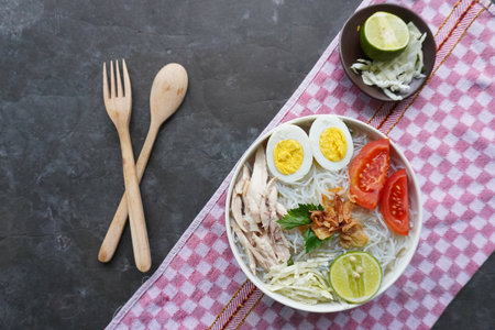 soto ayam bening or chicken soup is Indonesian food, made from rice, chicken broth, shredded...