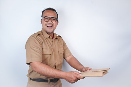 a man Asian civil servants or state civil servants is with brown uniform. gesturing provide...