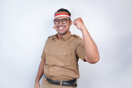 a man Asian civil servants or state civil servants is with brown uniform and red and white Headband...