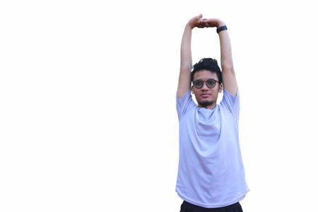 A man is stretching his arm. focus as the man works on his flexibility isolated white background