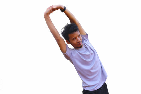A man is stretching his arm. focus as the man works on his flexibility isolated white backgroundの写真素材