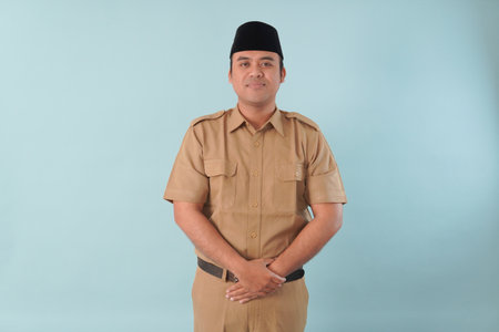 Smiling government worker with khaki uniform He is posing for a picture PNS, ASN civil servant concept.の写真素材