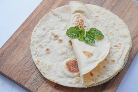 Flour Tortilla Wraps Homemade wheat tortillas, pita bread, tortilla, pita with ingredients for cooking on table. Top view. The concept of homemade food.の写真素材