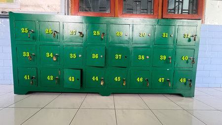 green wooden locker for storing items, concept security