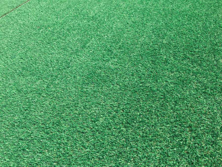 Artificial green grass texture background with copy space for work and design, Top viewの写真素材
