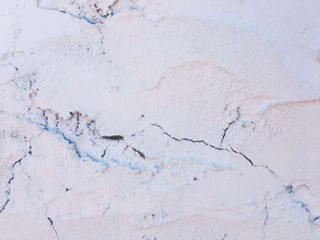 White  wall texture with crack for work and design. room interior concept with copy space.