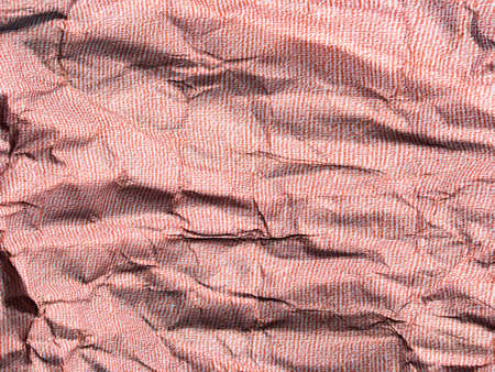 Beautiful pattern of red crumpled paper texture background. の写真素材