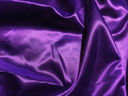 Closeup of purple satin or silk texture background. Copy space  with  elegant wallpaper designの写真素材