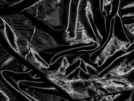 Black cloth or fabric texture background with liquid wave or wavy folds. Wallpaper designの写真素材