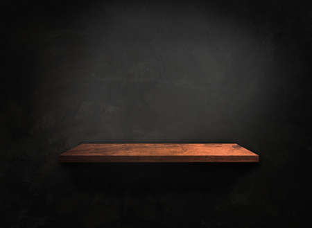 Wooden shelf on concrete wall texture backgroundの写真素材