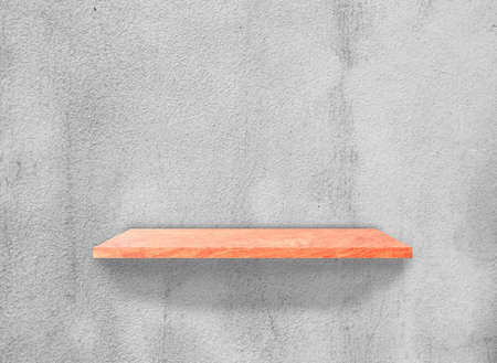 Wood shelves on concrete wall texture background . Top viewの写真素材