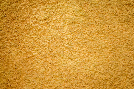 Modern of yellow concrete wall texture Background with copy space for text or designの写真素材
