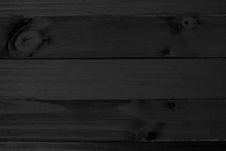 High resolution of Black wooden texture is perfect for making a background in design or text to make the work look more interesting.の写真素材