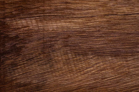 Dark scratched wood texture to made backgrounds for your designs to be good and beautiful. Natural materials with unique patterns and versatility. High quality and easy conveniently for your work.の写真素材