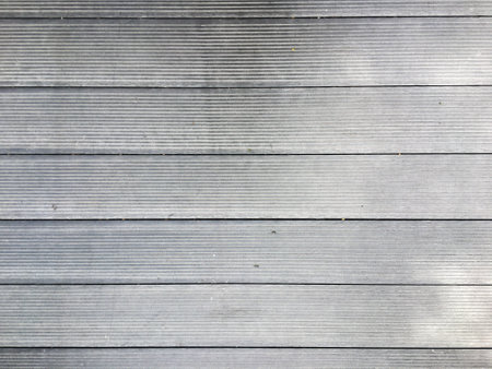 Nature-inspired wallpaper with a brown pine wood pattern, perfect for interior design.の写真素材