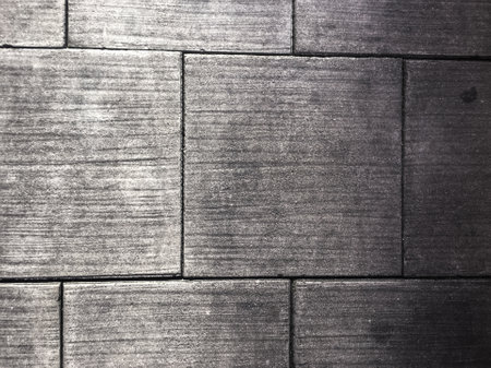 The abstract texture on the dark background creates a sense of depth and space, making it an ideal choice for artistic endeavorsの写真素材