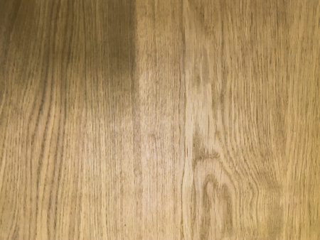 close-up shot capturing the detailed grain of a pine wood board.の写真素材