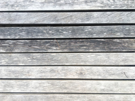 Nature-inspired wallpaper with a brown pine wood pattern, perfect for interior design.の写真素材