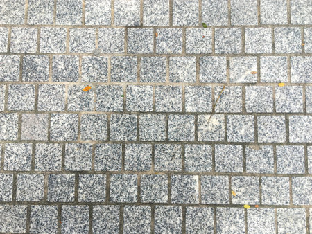 Rough and weathered concrete floor with a retro and vintage design.の写真素材