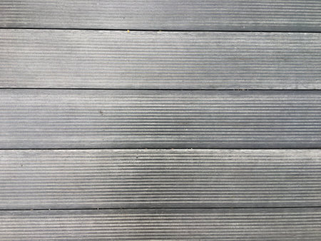 Nature-inspired wallpaper with a brown pine wood pattern, perfect for interior design.の写真素材