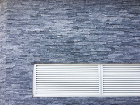 Dark concrete texture with a crumpled paper backdropの写真素材