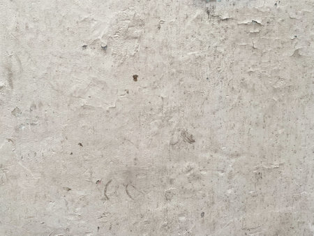 Dirty and ancient concrete wall with a crumpled paper effect.の写真素材