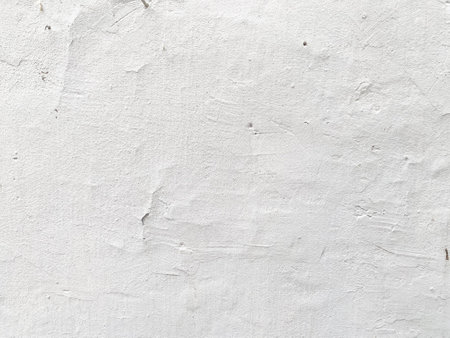 Closeup of a vintage concrete wall with a stucco finish.の写真素材