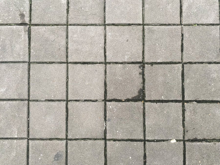 Dark and isolated concrete texture, offering a versatile and impactful design element.の写真素材