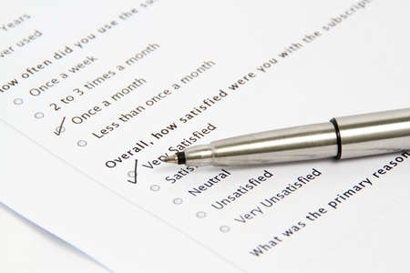 Pen Pointing at Survey and Questionnaire Form, business concept の写真素材