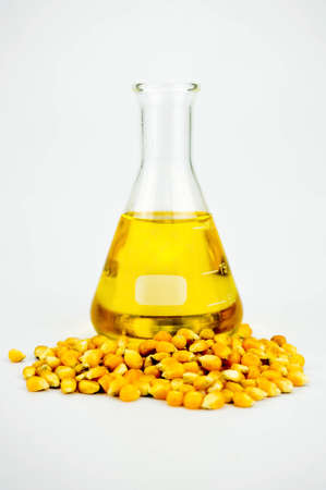 Agriculture concept, Corn generated ethanol bio-fuel with test tubes on white backgroundの写真素材