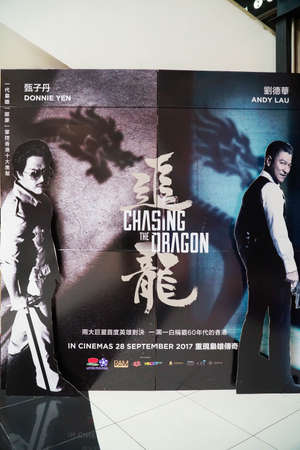 KUALA LUMPUR, MALAYSIA - SEPTEMBER 23, 2017: Chasing the Dragon movie poster. is an Hong Kong-Chinese action crime drama film starring Andy Lau and Donnie Yen as main actorのeditorial素材