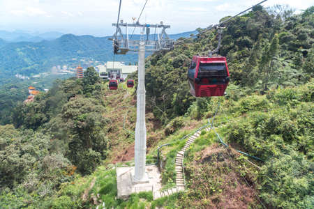 GENTING HIGHLAND, MALAYSIA - SEPTEMBER 16, 2017: The cable car ride, one of Genting Highland's most popular attractions, providing a method of travel between Awana Station and SkyAvenue mallのeditorial素材