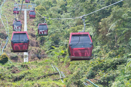 GENTING HIGHLAND, MALAYSIA - SEPTEMBER 16, 2017: The cable car ride, one of Genting Highland's most popular attractions, providing a method of travel between Awana Station and SkyAvenue mallのeditorial素材
