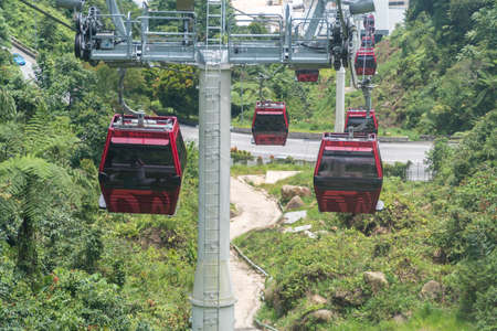 GENTING HIGHLAND, MALAYSIA - SEPTEMBER 16, 2017: The cable car ride, one of Genting Highland's most popular attractions, providing a method of travel between Awana Station and SkyAvenue mallのeditorial素材