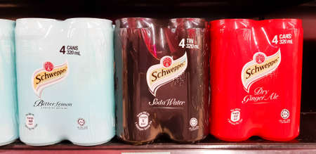 KUALA LUMPUR, MALAYSIA - JANUARY 17, 2018: Cans of soda drinks schweppes. Schweppes Mixers is a...