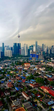 KUALA LUMPUR, MALAYSIA - AUGUST 25, 2018: Cityscape of Kuala Lumpur during cloudy and raining day.のeditorial素材