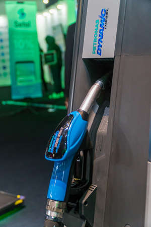 KUALA LUMPUR, MALAYSIA - NOVEMBER 23, 2018: Petronas Gas station pump with fuel nozzle