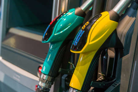 KUALA LUMPUR, MALAYSIA - NOVEMBER 23, 2018: Petronas Gas station pump with fuel nozzle